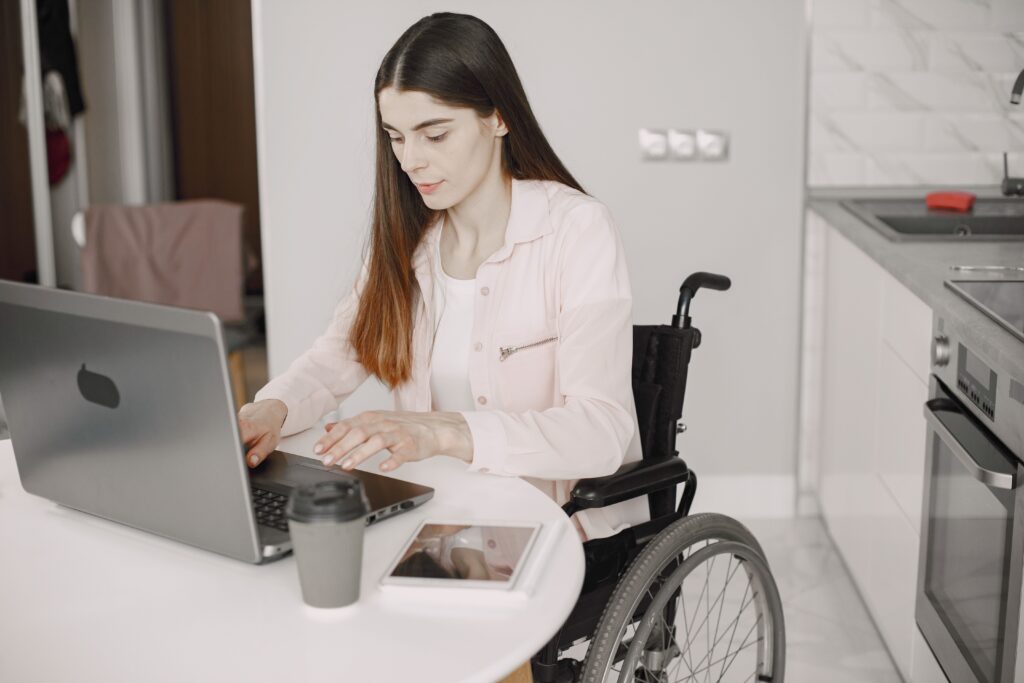 Woman in a wheelchair with home mobility solutions suited to her.