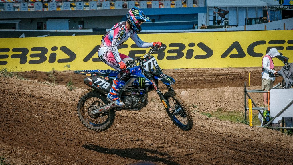 Female riding a motorcross bike.